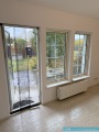 Ob.-Nr.-40251004-7-Wohnzimmer-Garten-Austritt