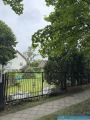 Obj.-Nr.-30250202-Grundstueck-vom-Gehweg-aus